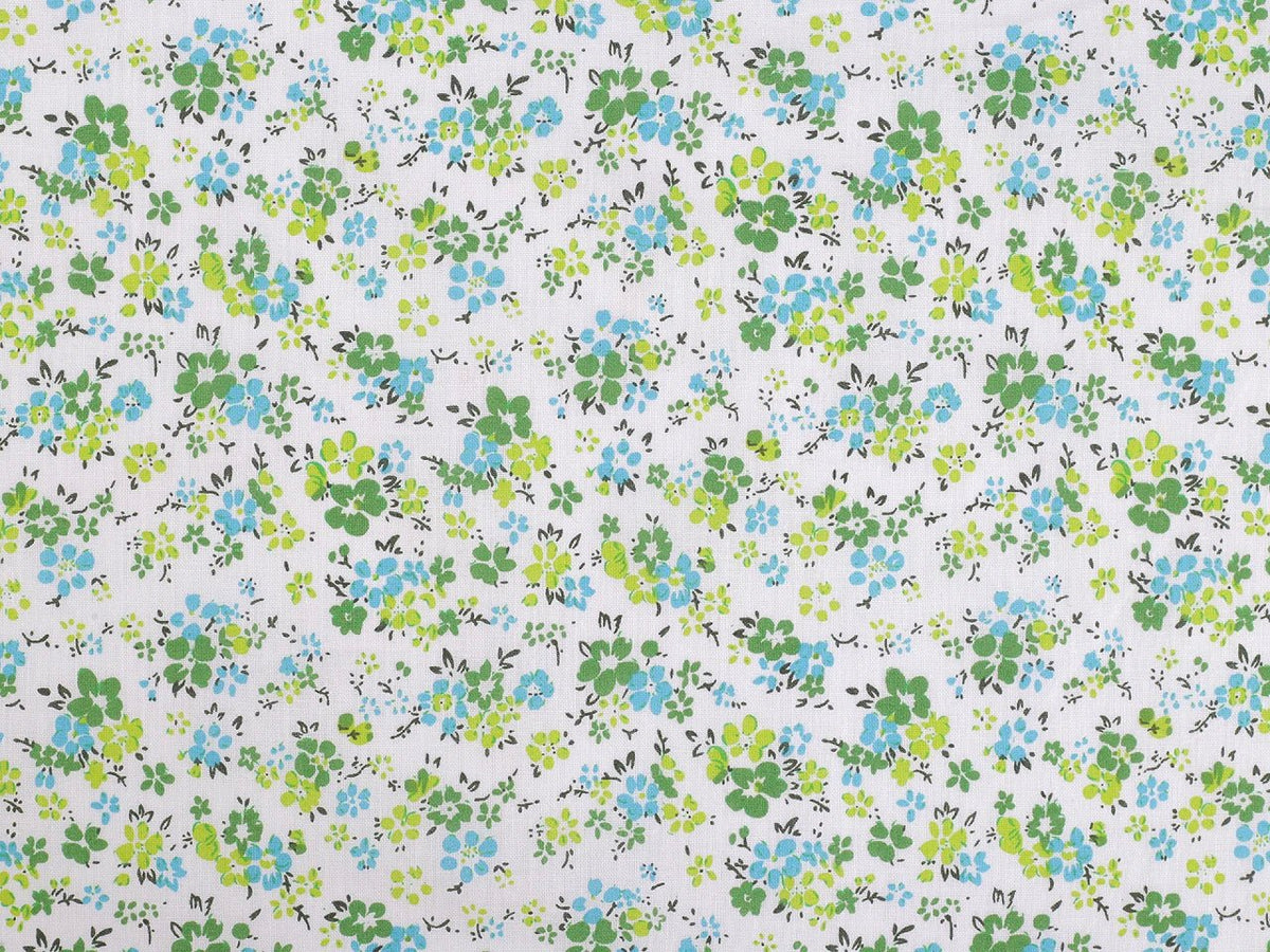 Image en tissu 100 % coton à petites fleurs vertes délicates – disponible en ligne chez Šarlotes audumi