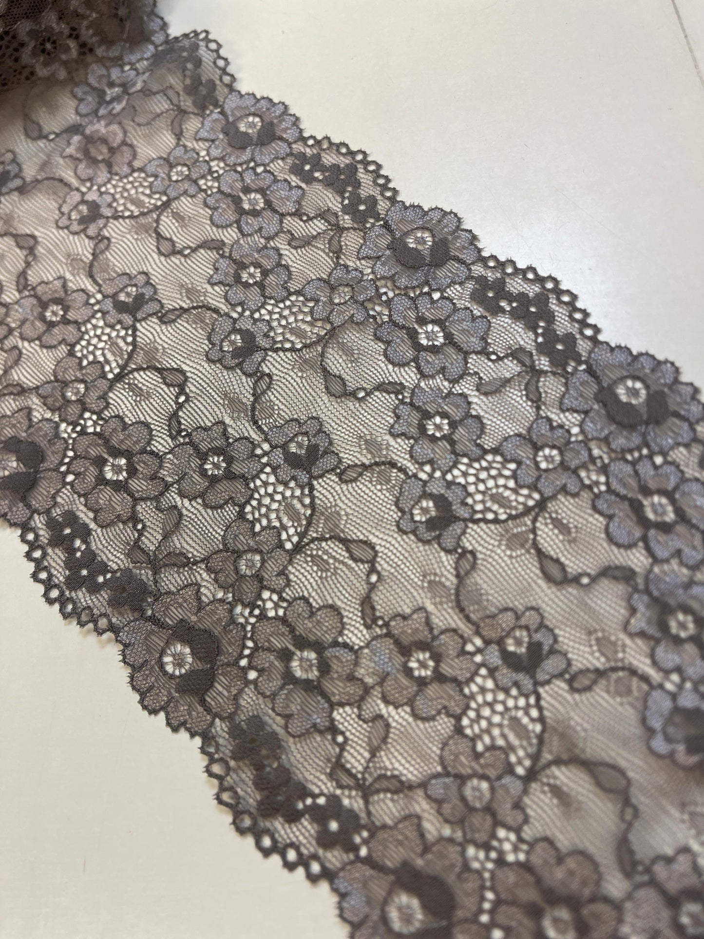 Image with elastic lace 15 cm-warm grey – available online at Charlotte's Fabrics