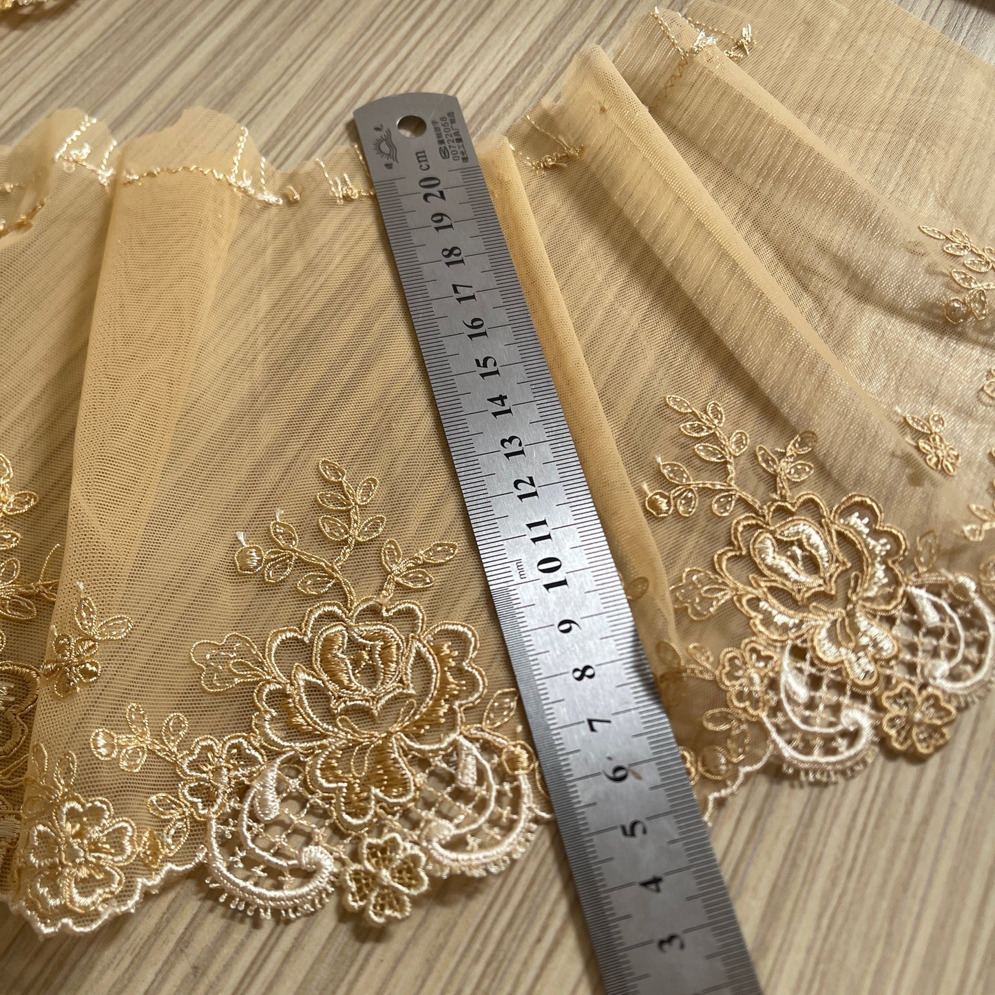 Image of embroidered lace 15 cm - skin-colored with light accents – available at Šarlotes audumi