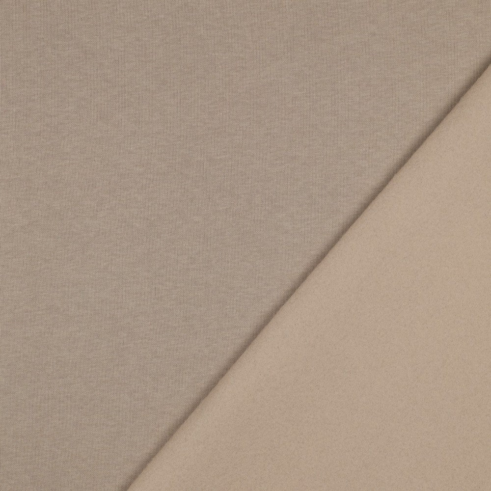 Image de maille chaude en coton - beige 285 g/m² – disponible chez Šarlotes audumi