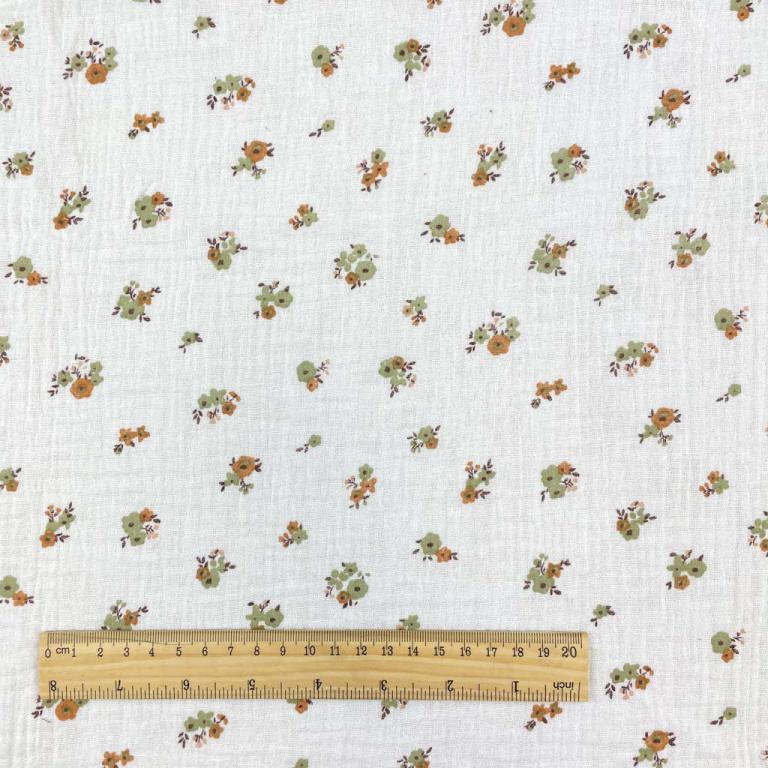alt
Mousseline - fleurs sur fond orange 130 g/m²