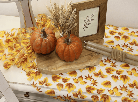 Image of organza fabric with a shimmering autumn leaf pattern – available online at Charlotte's Fabrics