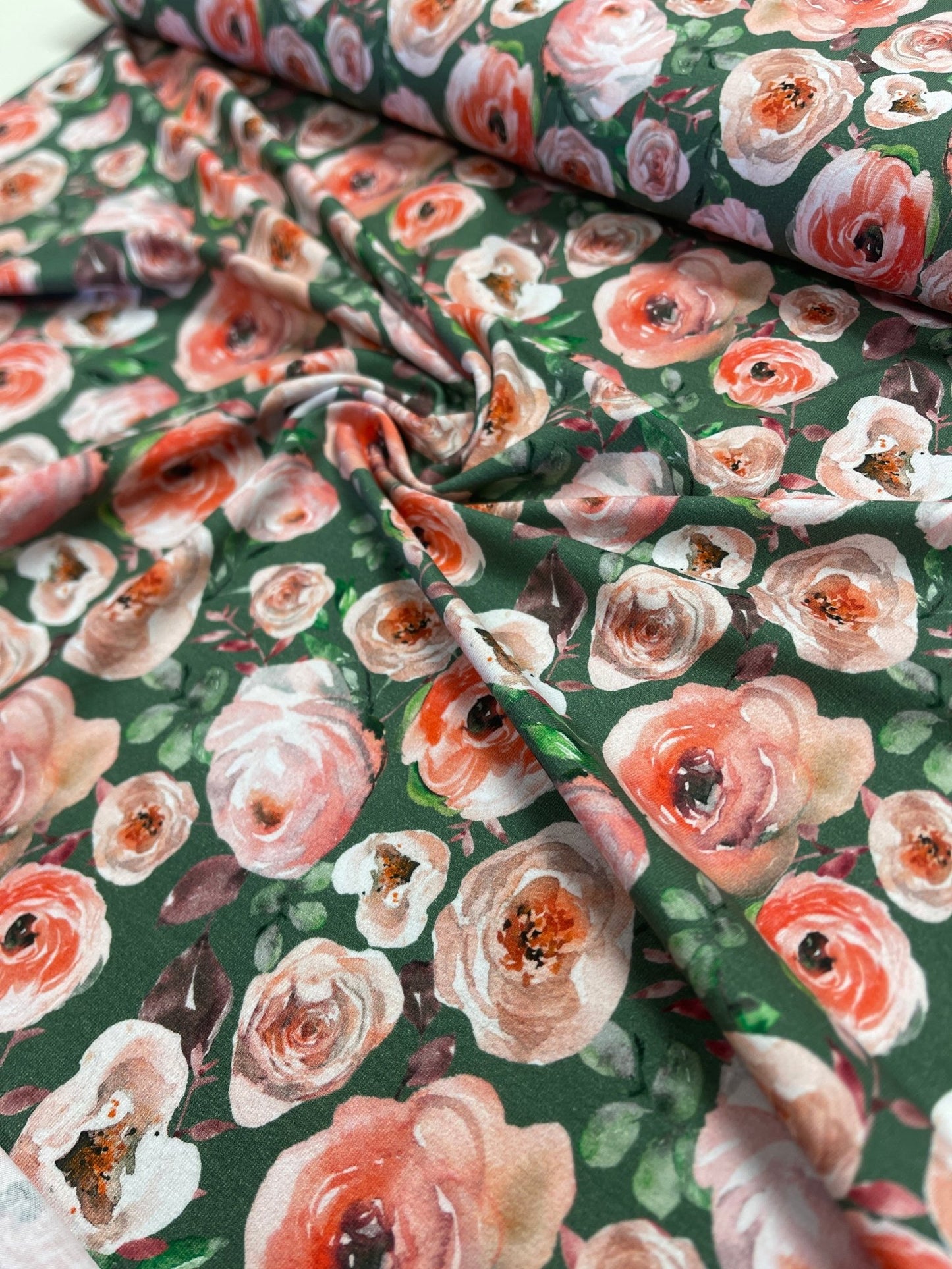 Lightweight cotton jersey - roses on a green background 200 g/m²