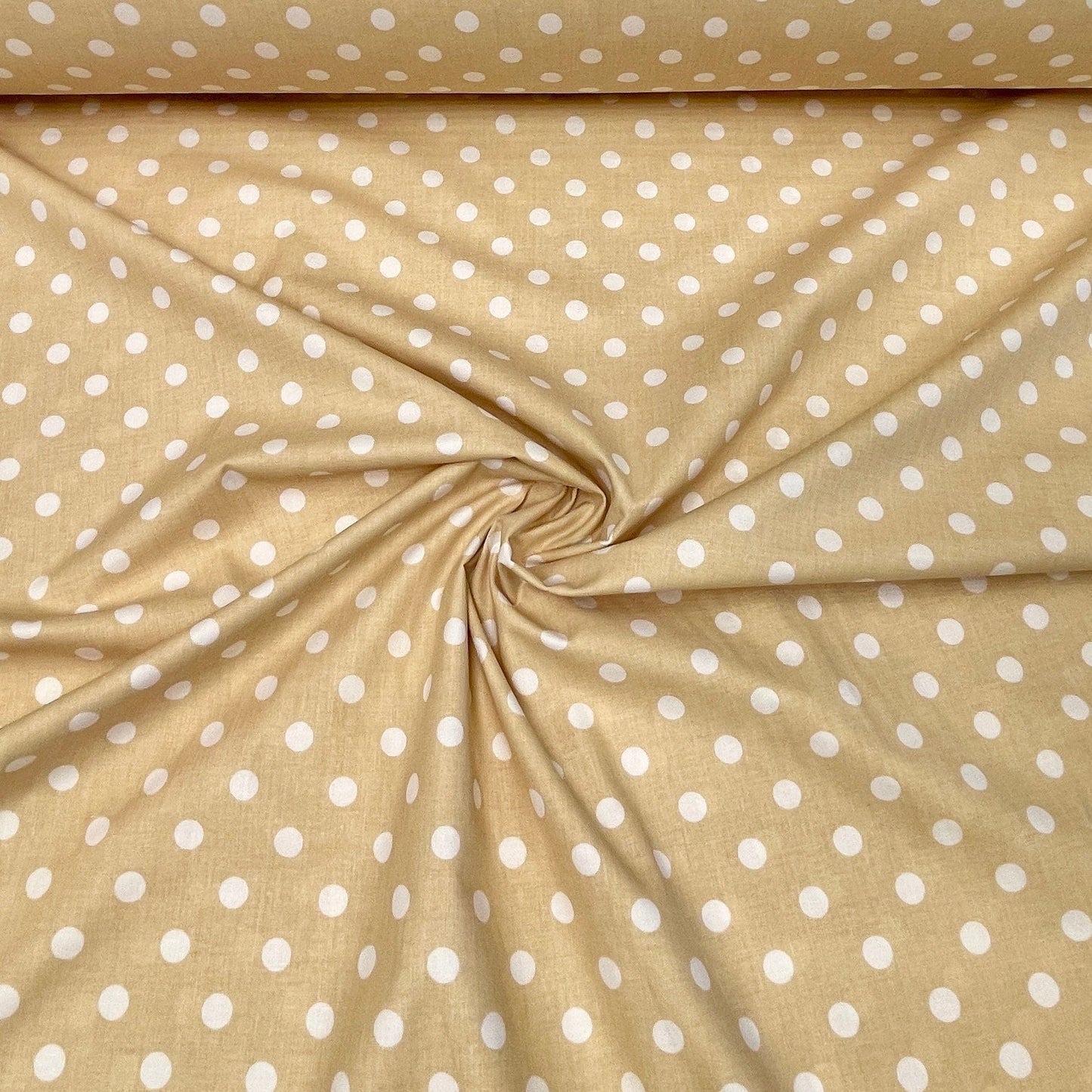 100% Cotton fabric - pompoms on a soft yellow background 125 g/m²