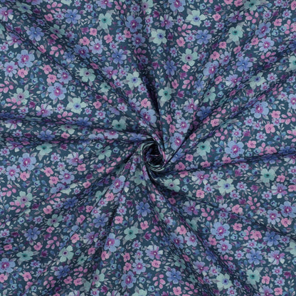 Tissu premium 100 % coton - petites fleurs sur fond pétrole 110 g/m²