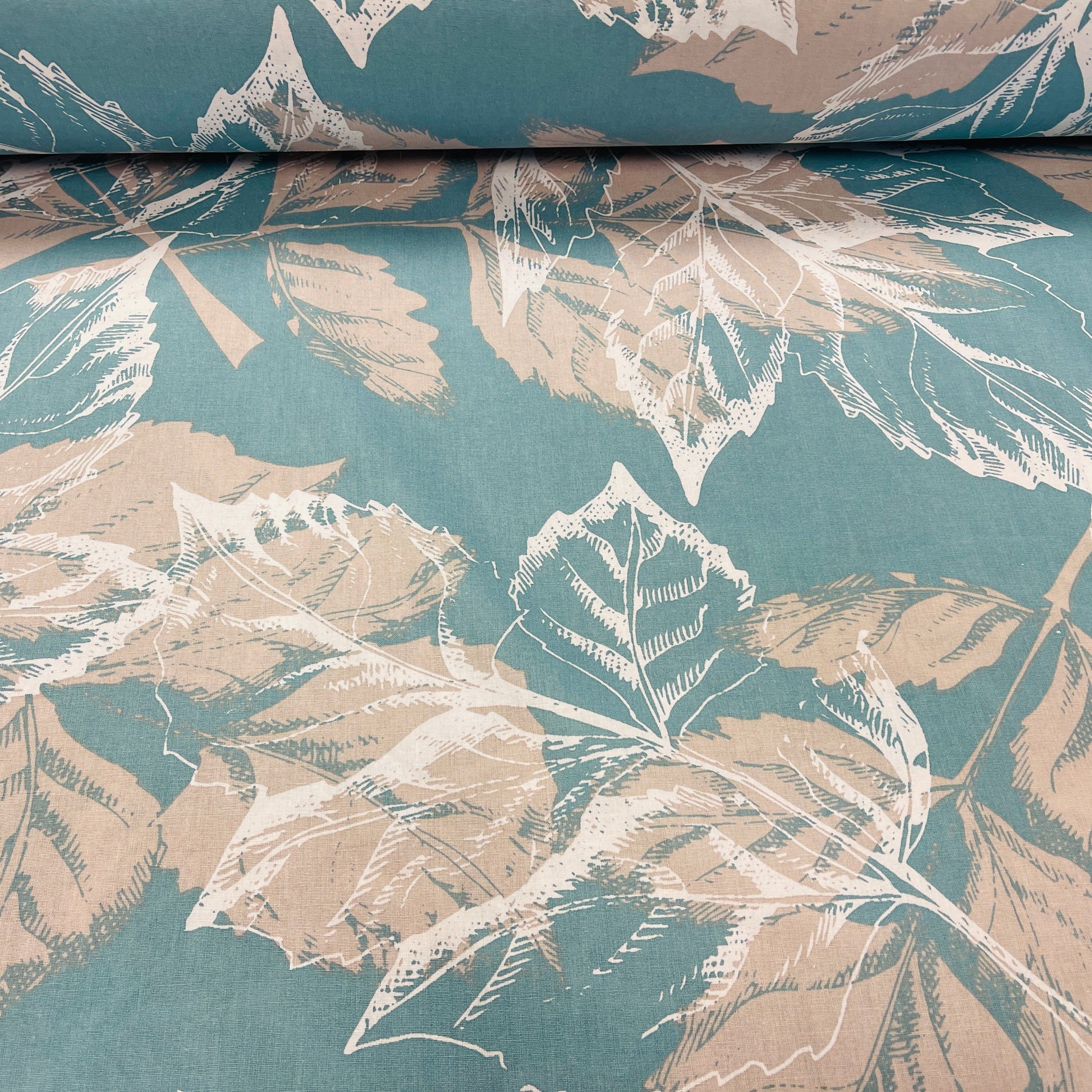 Tissu 100 % coton - motif feuilles sur fond turquoise 220 cm 146 g/m²