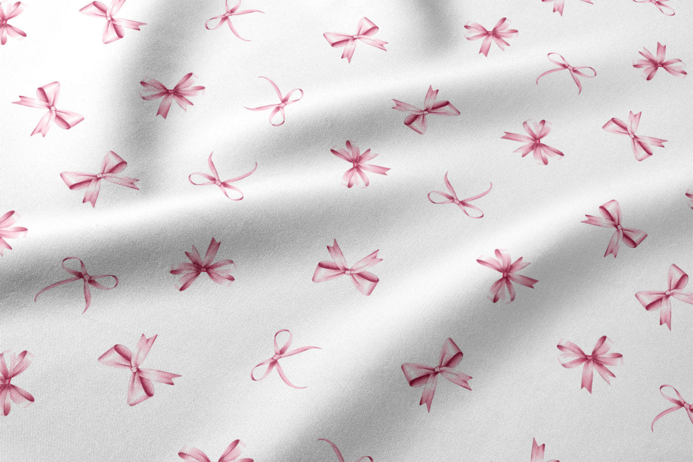 Image of 100% cotton fabric with pink ribbons – available online at Charlotte's Fabrics