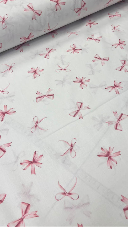 Image of 100% cotton fabric - pink bows, available online at Šarlotes audumi