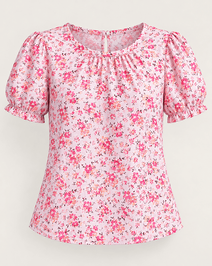 Image d’un tissu 100 % coton à petites fleurs roses – disponible en ligne chez Šarlotes audumi