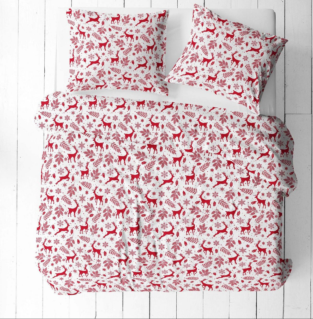 Tissu 100 % coton avec des cerfs rouges sur fond blanc – disponible en ligne chez Tissus de Charlotte