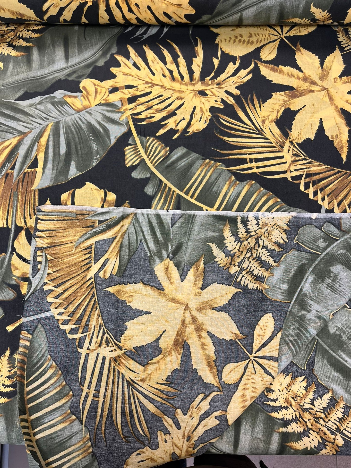 Image with 100% Cotton Fabric - Dark Leaves 125 g/m² – available at Charlotte's Fabrics