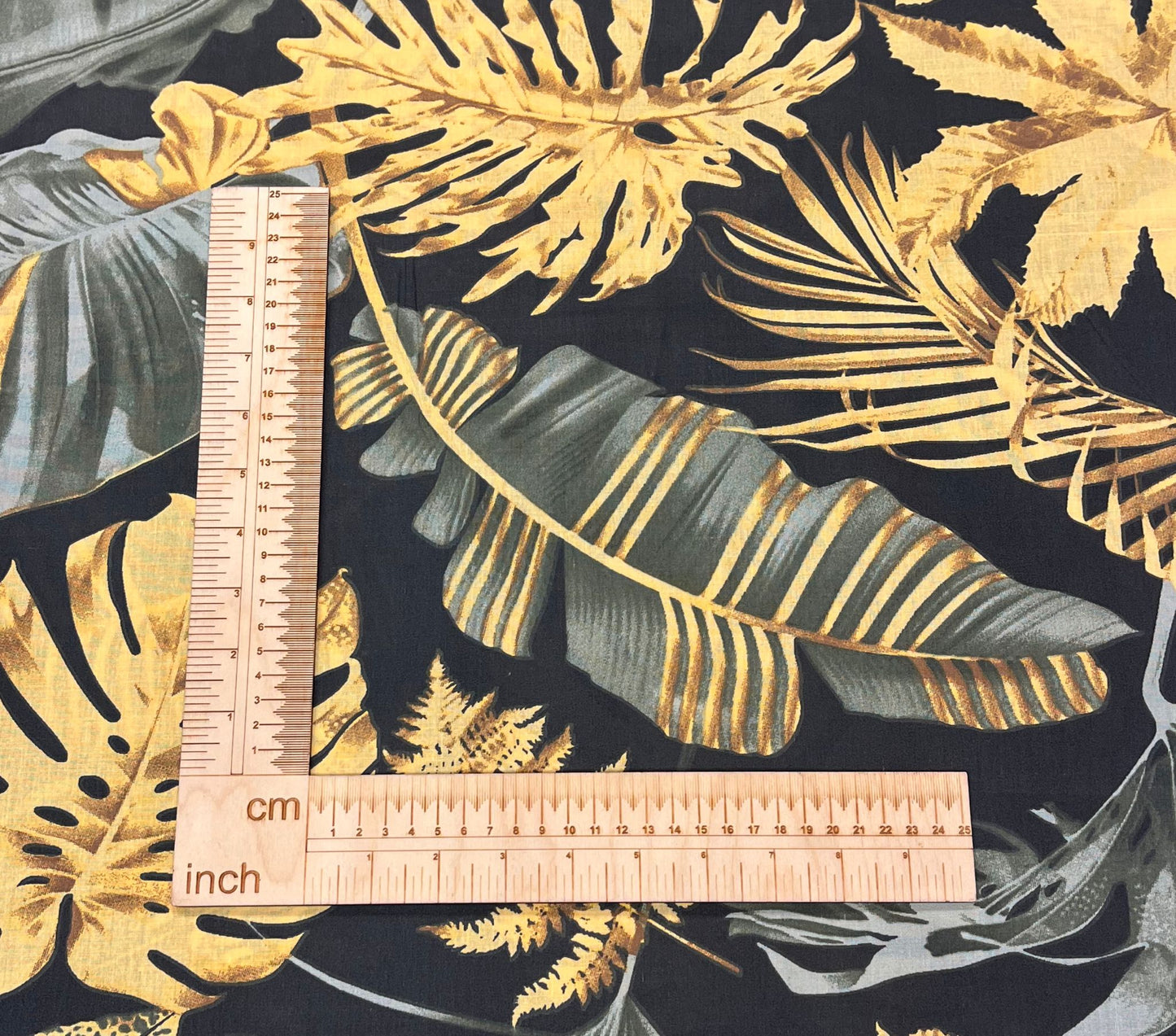 Image of 100% cotton fabric - dark leaves 125 g/m² – available at Šarlotes audumi