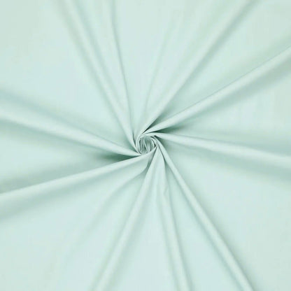 Image avec tissu 100 % coton, ton menthe frais, 125 g/m² – disponible chez Šarlotes audumi
