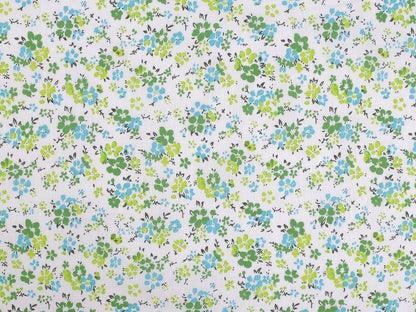 Image en tissu 100 % coton à petites fleurs vertes délicates – disponible en ligne chez Šarlotes audumi