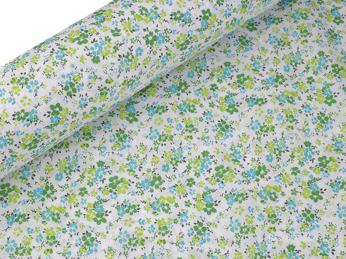 Image en tissu 100 % coton à petites fleurs vertes délicates – disponible en ligne chez Šarlotes audumi