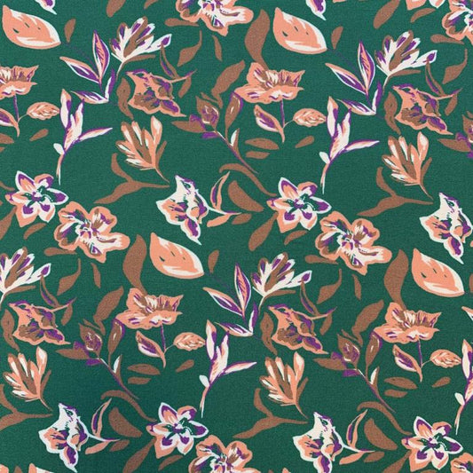 Tissu 100 % viscose - motif floral abstrait sur fond vert 125 g/m²