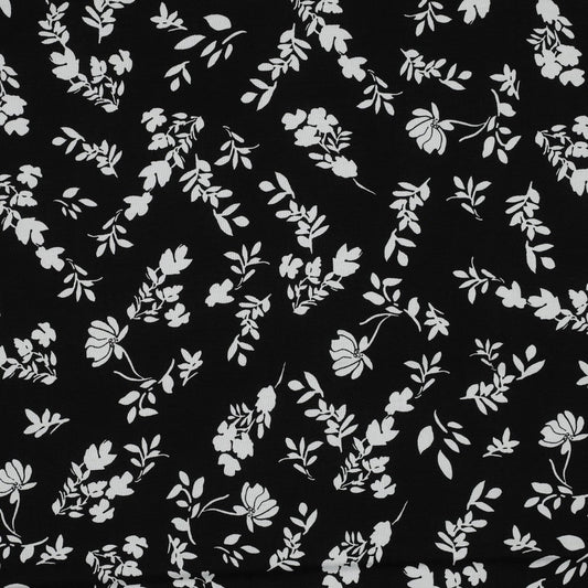 100 % tissu en viscose - fleurs blanches sur fond noir 110 g/m²