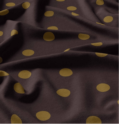 Image de tissu 100 % viscose à cercles kaki sur fond brun – disponible en ligne chez Tissus Charlotte