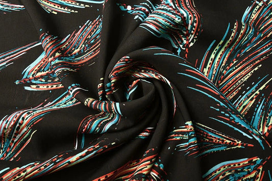 100 % tissu de viscose - motif coloré de plumes 95 g/m²