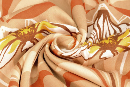 Tissu 100 % viscose - fleurs orange 100 g/m²
