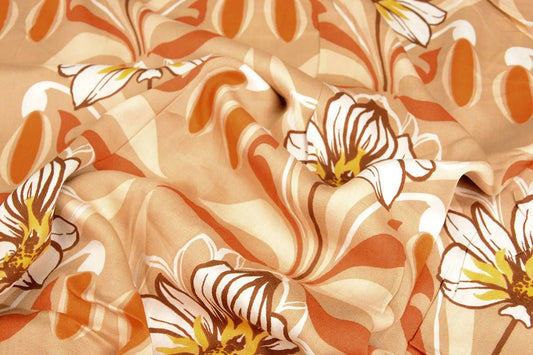 100% Viskosestoff - orange Blumen 100 g/m²