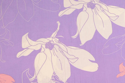 Tissu 100 % viscose - fleurs sur fond lilas 105 g/m²