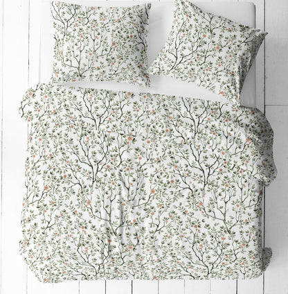 Tissu 100 % coton – délicates petites branches vertes avec des fleurs sur fond blanc