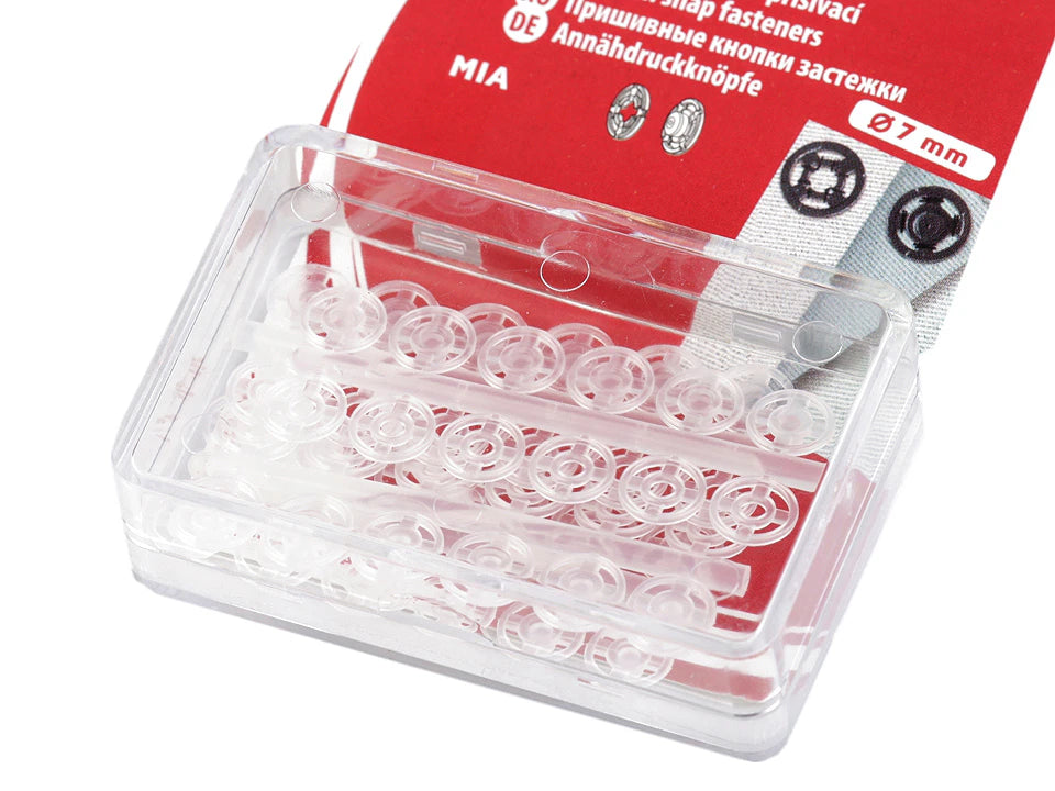 Piešujamas caurspīdīgas plastmasas spiedpogas – 7 mm, 10 mm, 13 mm un 15 mm