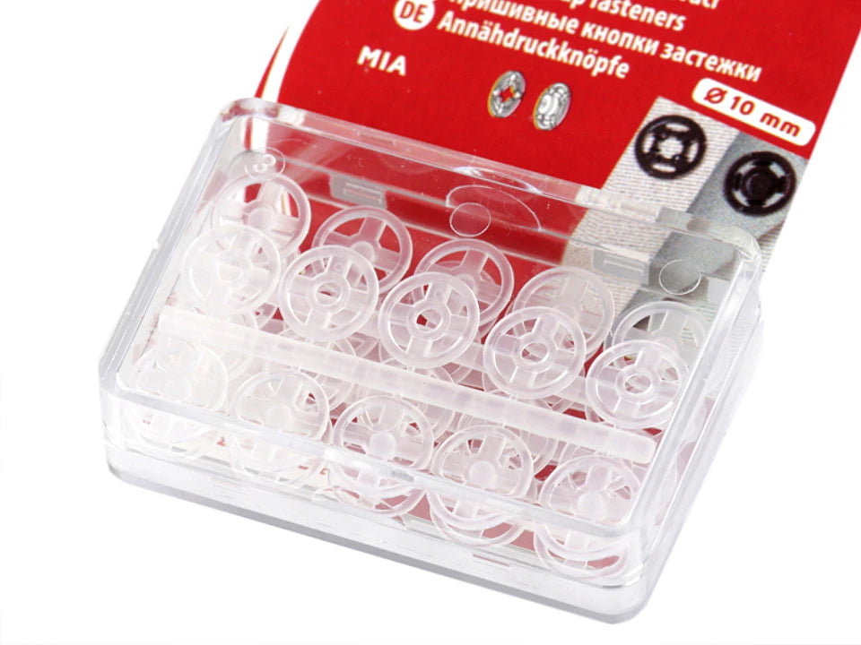 Piešujamas caurspīdīgas plastmasas spiedpogas – 7 mm, 10 mm, 13 mm un 15 mm