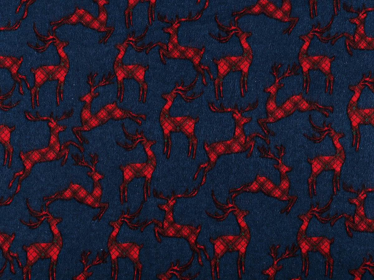 Flanelle de coton de Noël avec des rennes sur fond bleu