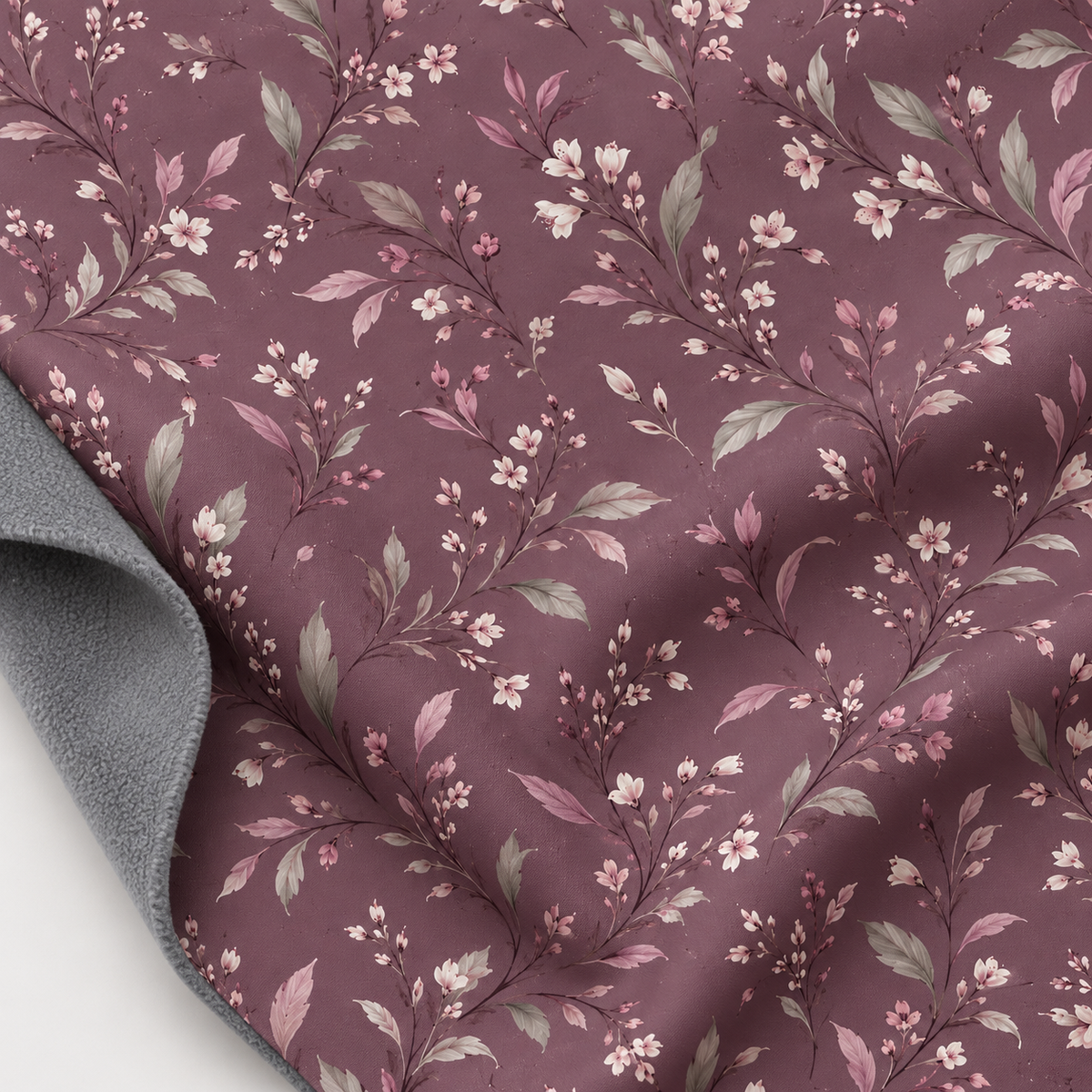 Tissu softshell à motif floral sur fond vieux rose