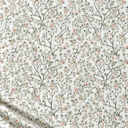 Tissu 100 % coton – délicates petites branches vertes avec des fleurs sur fond blanc