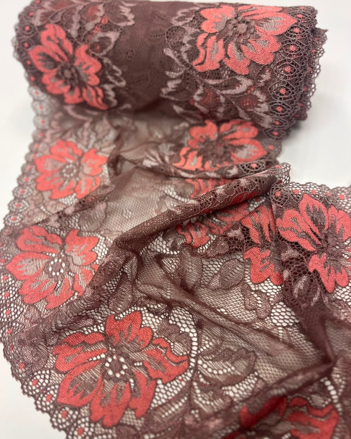 Image of flexible lace, 22 cm, brown with orange flowers – available online at Šarlotes audumi