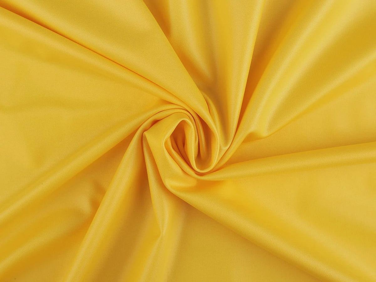 Image de tricot extensible avec revêtement imperméable jaune - lot de 1 m – disponible en ligne chez Šarlotes audumi