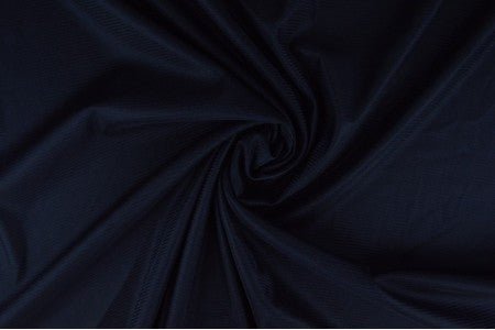 Image avec doublure en maille extensible - bleu foncé 75 g/m² – disponible chez Tissus Charlotte