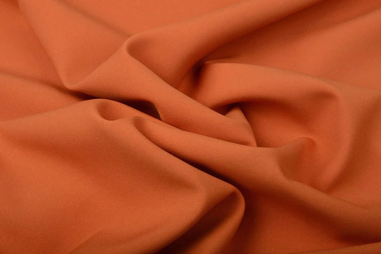 Image with orange gabardine – available online at Charlotte's Fabrics