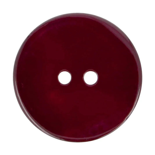 Image d’un bouton coquillage bordeaux – disponible en ligne chez Šarlotes audumi