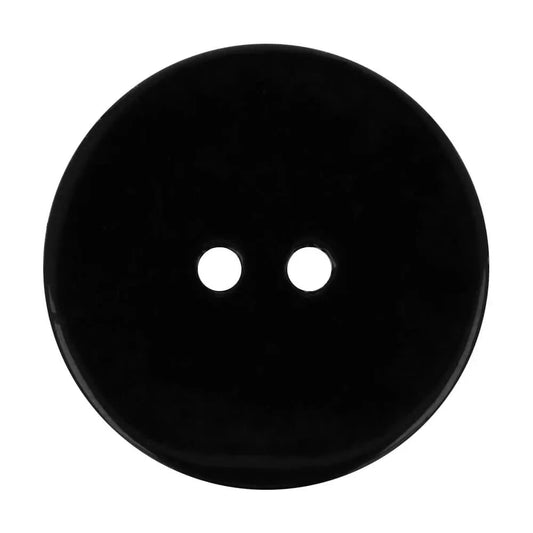 Image d’un bouton coquillage noir – disponible en ligne chez Šarlotes audumi