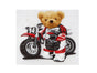 Bear next to the motorcycle