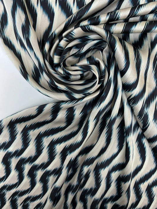 Image of Italian satin fabric, beige-blue with an abstract pattern, 85 g/m2 – available at Šarlotes audumi