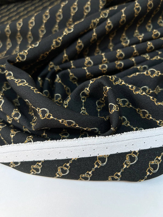 Image of Italian crepe fabric with chain pattern | Polyester 100% | 152 cm – available at Šarlotes audumi