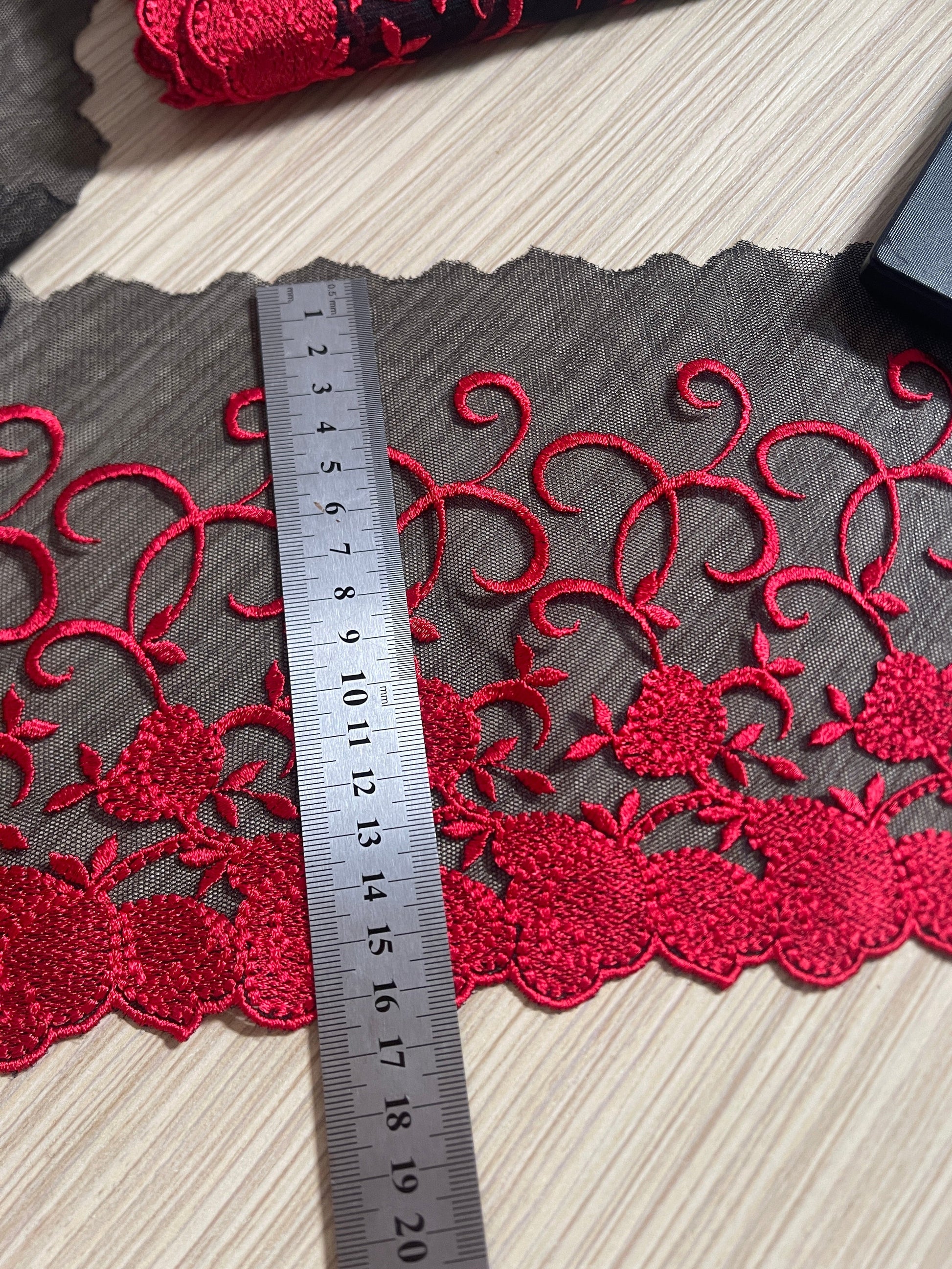 Embroidered lace, 15 cm - black with red accents – available at Šarlotes audumi