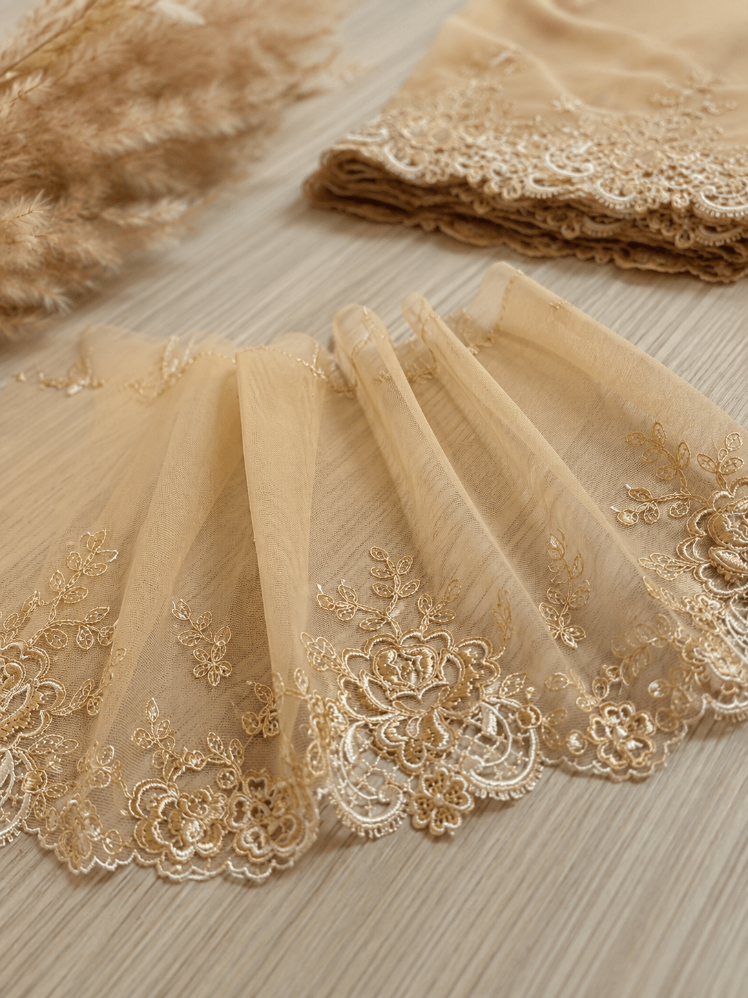 Embroidered lace, 15 cm - flesh-colored with light accents - available at Charlotte's Fabrics