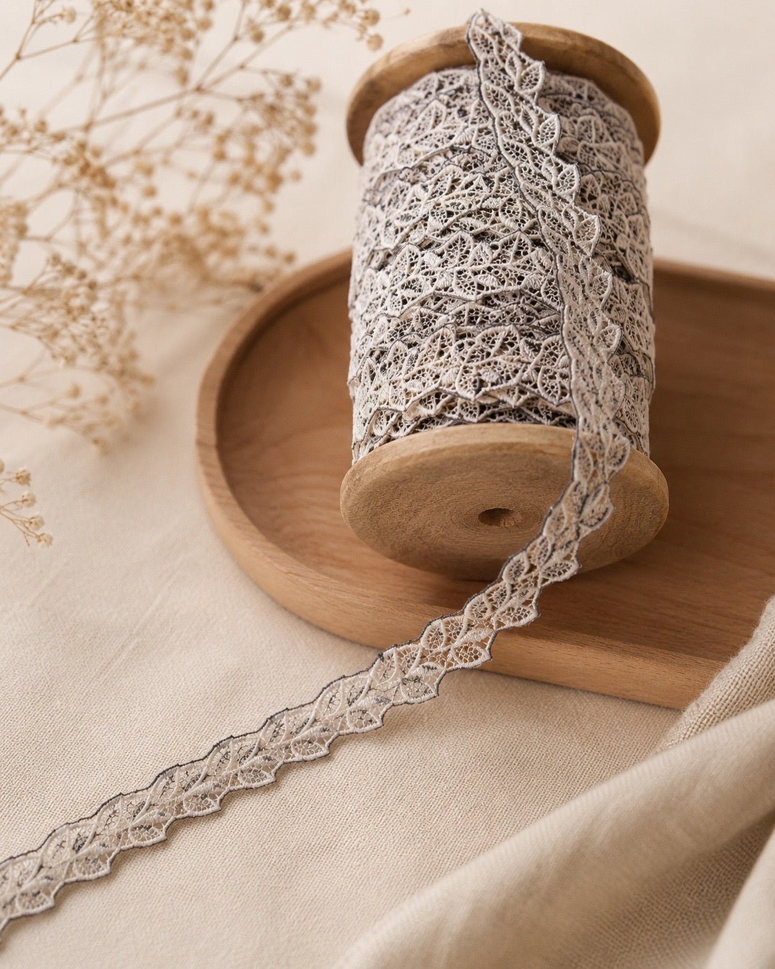 Embroidered lace ribbon, 2 cm - white with black accents – available at Šarlotes audumi
