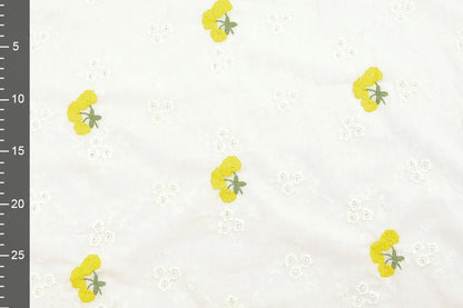 Tissu en coton brodé - fleurs jaunes 110 g/m²