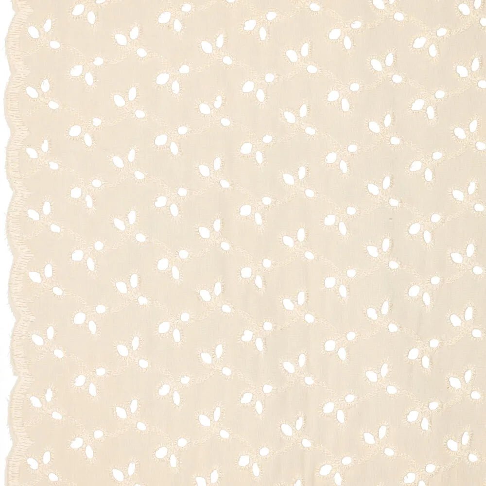 Tissu en coton brodé - broderie sur fond beige 115g/m²