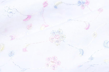Tissu en coton brodé - broderie colorée 110 g/m²