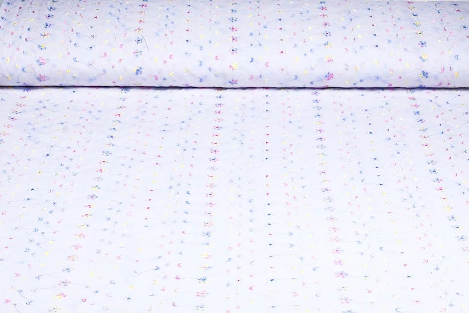 Tissu en coton brodé - broderie colorée 110 g/m²