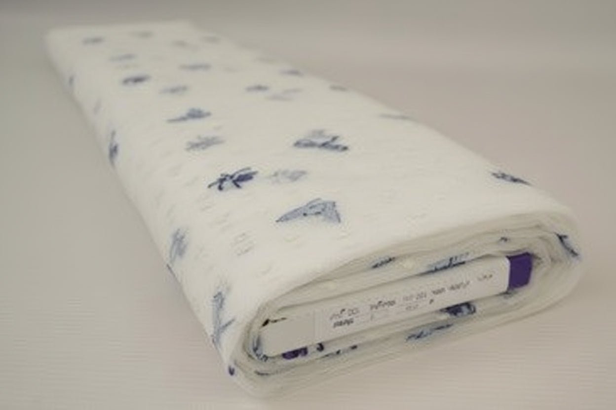 Image of embroidered tulle fabric with butterflies 100 g/m² – available at Šarlotes audumi