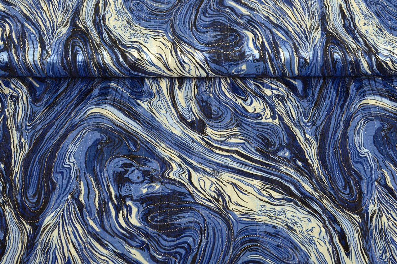 Image d’une robe en tissu à effet métallisé - ciel nocturne 110 g/m² – disponible chez les tissus de Charlotte
